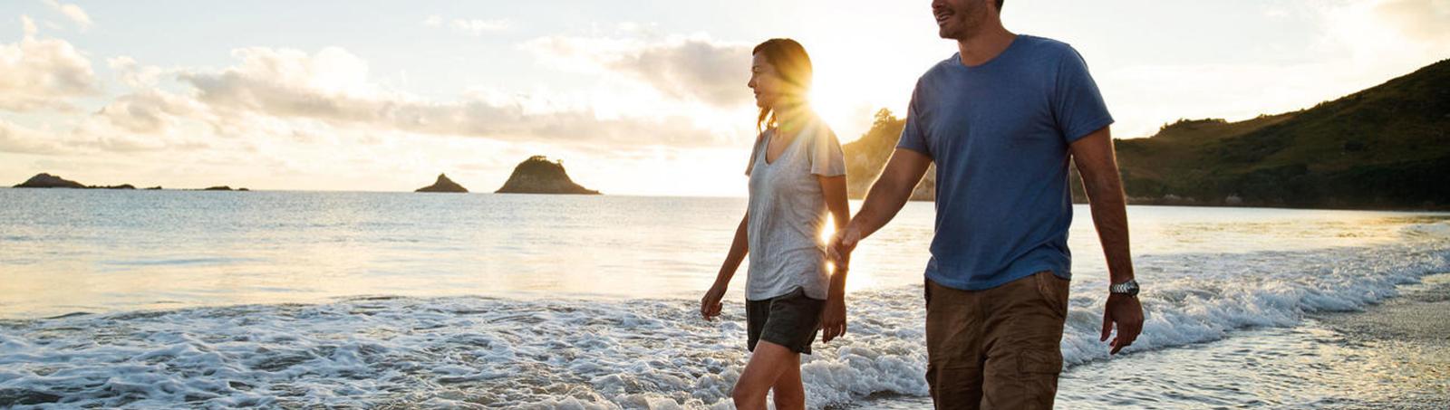 Romantic walk alon a Corromandel beach.