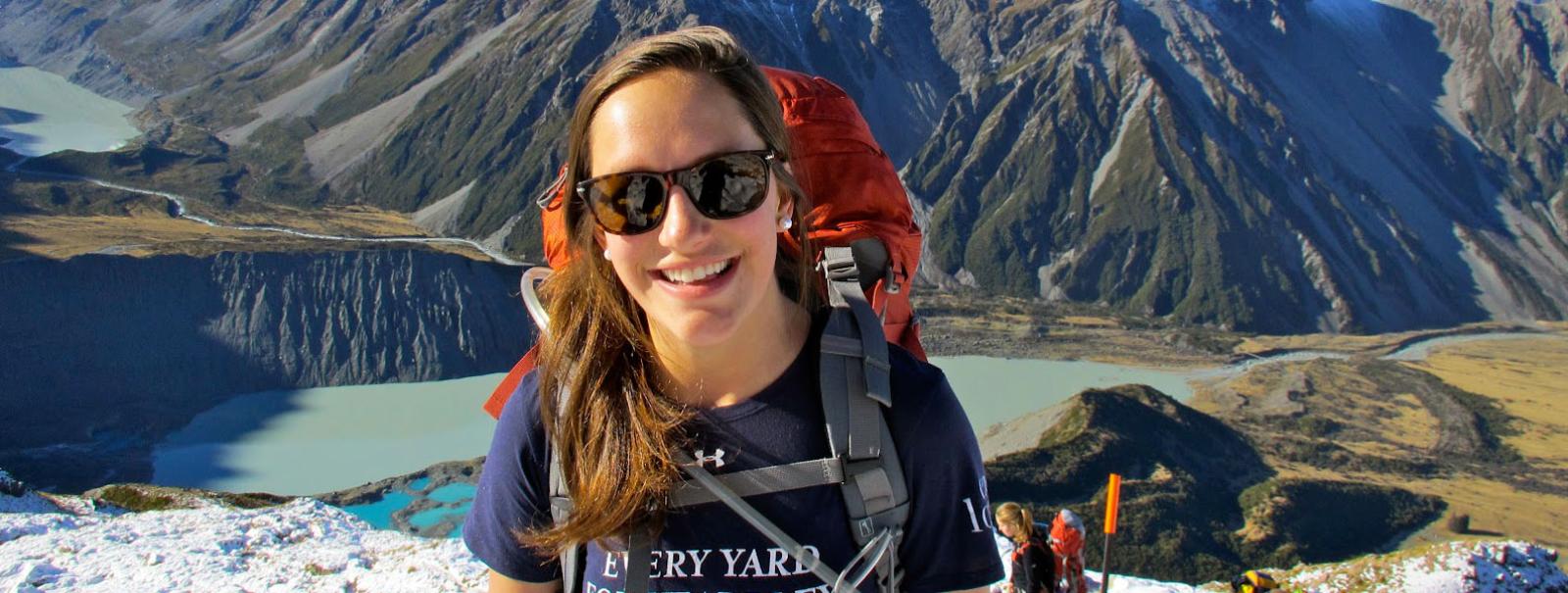 Girl hiking high in the Southern Alps, Mt Cook National Park.