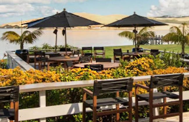Sands Hotel Omapere sand dunes and water view