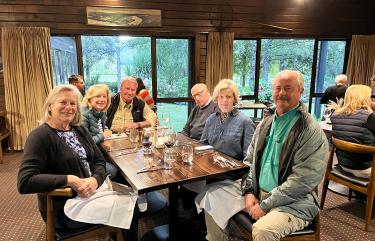 Davis group enjoy a meal together