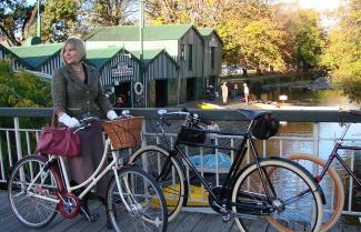 Lady on a bridge in Christchurch as she rests after her city tour.